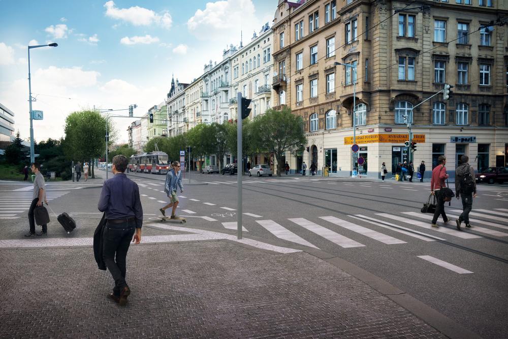 V navrhovaném řešení je zastávka tramvaje do centra napojena na přechod pro chodce v křižovatce, takže bude přístupnější. Celkově jsou zkráceny délky přechodů, aby bylo z